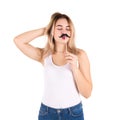 Young cute girl with moustache, studio Royalty Free Stock Photo