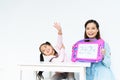 Young cute happy little girl learning simple mathematic equation, beautiful Asian mother teach using toy board Royalty Free Stock Photo