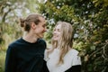 Young Cute Romantic Beautiful Loving Couple Face to Face Looking into Each Others Eyes Outside in Nature Royalty Free Stock Photo