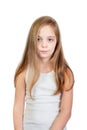 Young cute serious girl with grey blue eyes and long light brown hair Royalty Free Stock Photo