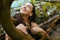 Young cute smiling woman in park Royalty Free Stock Photo