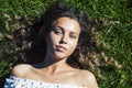 young cute summer girl on green grass outside relaxing smiling, lifestyle people concept Royalty Free Stock Photo