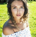 young cute summer girl on green grass outside relaxing smiling, lifestyle people concept Royalty Free Stock Photo