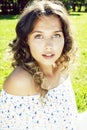 young cute summer girl on green grass outside relaxing smiling, lifestyle people concept Royalty Free Stock Photo