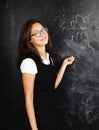 Young cute tanned mulatto teenage girl happy pointing, thinking, education concept people lifestyle Royalty Free Stock Photo