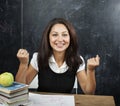 Young cute tanned teenage girl happy pointing, thinking, education concept Royalty Free Stock Photo