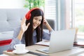 Young Cute Woman feels happy while video call Meeting on Work For Home Period.