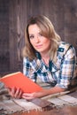 Young cute woman reading a book Royalty Free Stock Photo