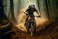 Young cyclist wearing protective gear rides an agile mountain bike through a mountain filled with tall trees. The road surface was