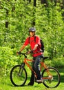 A young cyclist in the woods