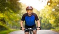 Young cyclists ride bike with helmet