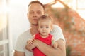 Young dad holding and hugging his little sweet daughter Family concept about love and care Royalty Free Stock Photo