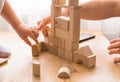 Young dad play with building bricks with small son Royalty Free Stock Photo