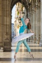 Young dancer with tutu and turqoise trikot