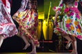 Young dancer woman barefoot in gypsy dress dancing on stage Royalty Free Stock Photo