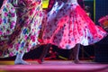 Young dancer woman barefoot in gypsy dress dancing on stage Royalty Free Stock Photo