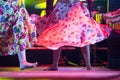 Young dancer woman barefoot in gypsy dress dancing on stage Royalty Free Stock Photo