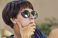 Thoughtful, female, girl , young, beautiful, woman, sunglasses Royalty Free Stock Photo