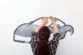 Woman paint little car Royalty Free Stock Photo