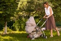 A young dark-haired woman with baby Royalty Free Stock Photo