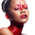 Young dark-skinned girl with abstract asymmetric red make-up Royalty Free Stock Photo