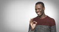 African American man with happy look shows OK-gesture with his fingers Royalty Free Stock Photo