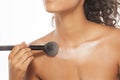 Decolletage - highlighter apply Royalty Free Stock Photo