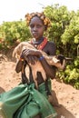 Young Dassanech girl with a goat