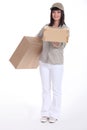 Young deliverer of packages Royalty Free Stock Photo