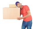 Young delivery man holding carton box and hearing in uniform Royalty Free Stock Photo