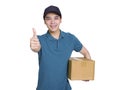 Young delivery man holding carton package and showing thumbs up