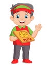 young delivery man holding a pizza box while isolated on white background Royalty Free Stock Photo