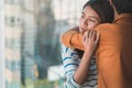 Young depressed asian woman hug her friend for encouragement, Selective focus, PTSD Mental health concept Royalty Free Stock Photo