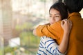 Young depressed asian woman hug her friend for encouragement, Selective focus, PTSD Mental health concept Royalty Free Stock Photo