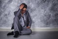 Depressed businessman sitting on the floor Royalty Free Stock Photo