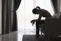 Young depressed woman domestic and rape violence beaten and raped sitting in the corner International Day for the Elimination Royalty Free Stock Photo