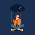 Young depressed woman sitting on ground crying with rain and storm with thunder above .