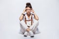 Young depression woman sitting on the floor. Royalty Free Stock Photo