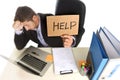 Young desperate businessman suffering stress working at office c Royalty Free Stock Photo