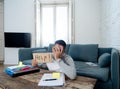 Young desperate student in stress working and studying holding a help sign Royalty Free Stock Photo