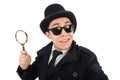 Young detective in black coat holding magnifying