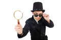 Young detective in black coat holding magnifying Royalty Free Stock Photo