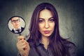 Confident woman posing with magnifier Royalty Free Stock Photo