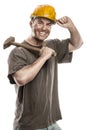 Young dirty Worker Man With Hard Hat helmet holding a hammer