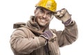 Young dirty Worker Man With Hard Hat helmet holding a hammer a