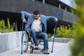 Young disabled man on a wheelchair Royalty Free Stock Photo