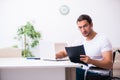 Young disabled man working from house Royalty Free Stock Photo