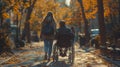 Young disabled woman in a wheelchair with boyfriend. Man with disabled girl in a wheelchair