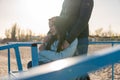 Young disabled woman in wheelchair with her mother walking near the sea on the ramp for people with disabilities. Family Royalty Free Stock Photo