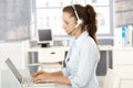 Young dispatcher working in bright office Royalty Free Stock Photo